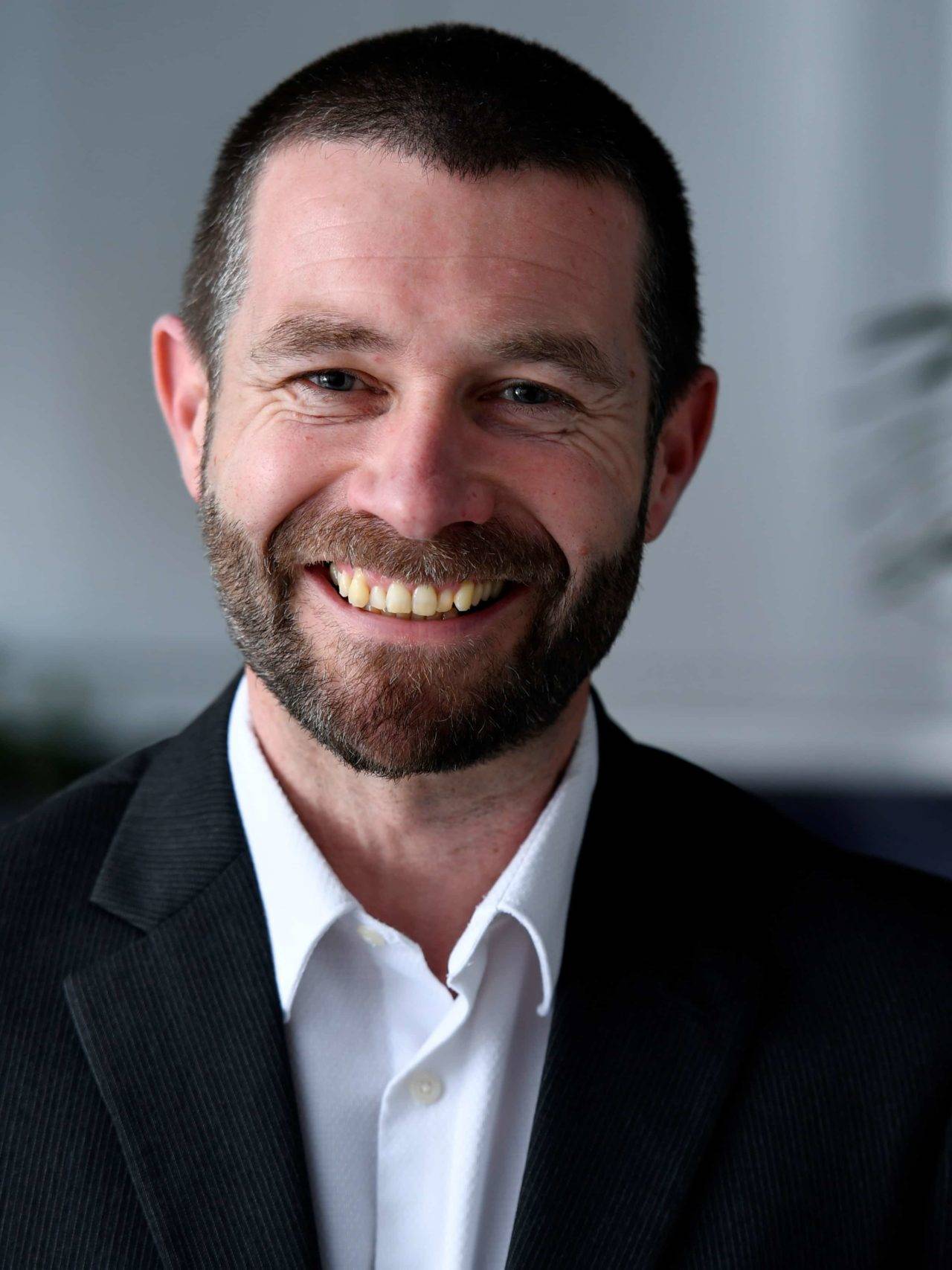 Brett Baker Investment Analyst