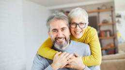 Happy older couple thanks to financial planning