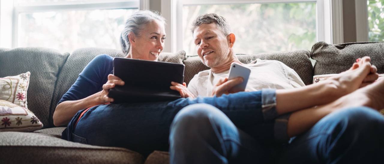 Couple embracing technology