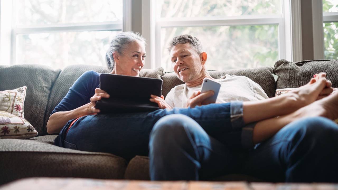 Couple embracing technology