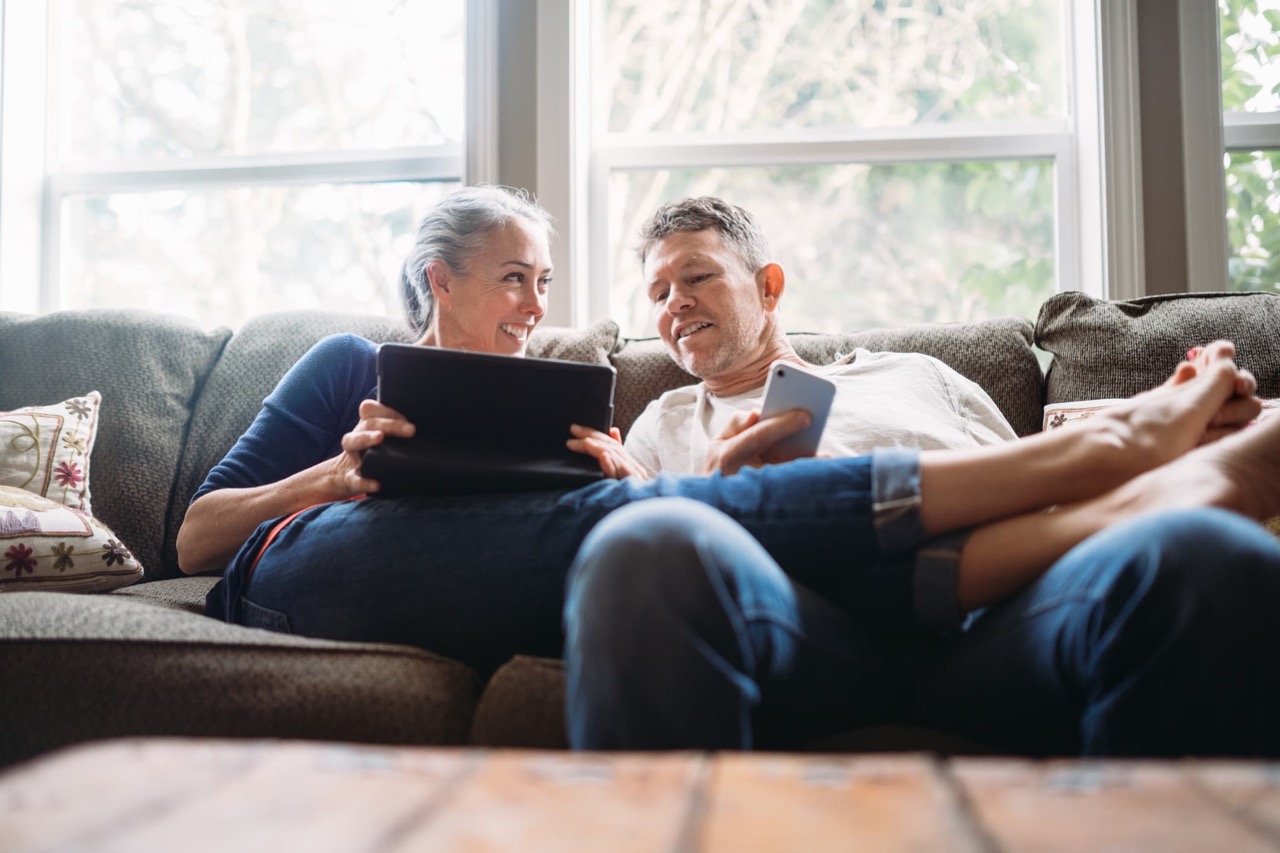 Couple embracing technology
