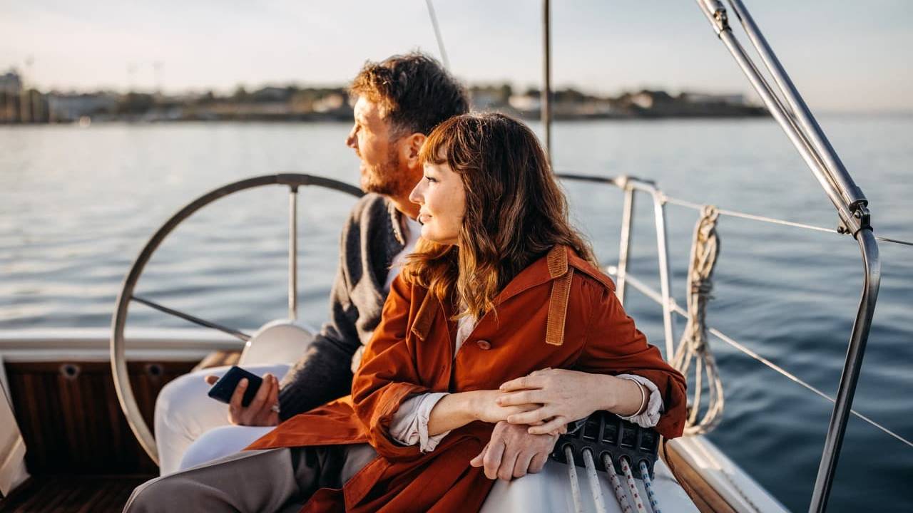 Couple enjoying a yacht ride