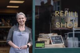 Lady stood in shop doorway