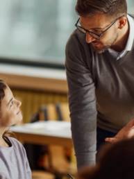 Teacher speaking to student