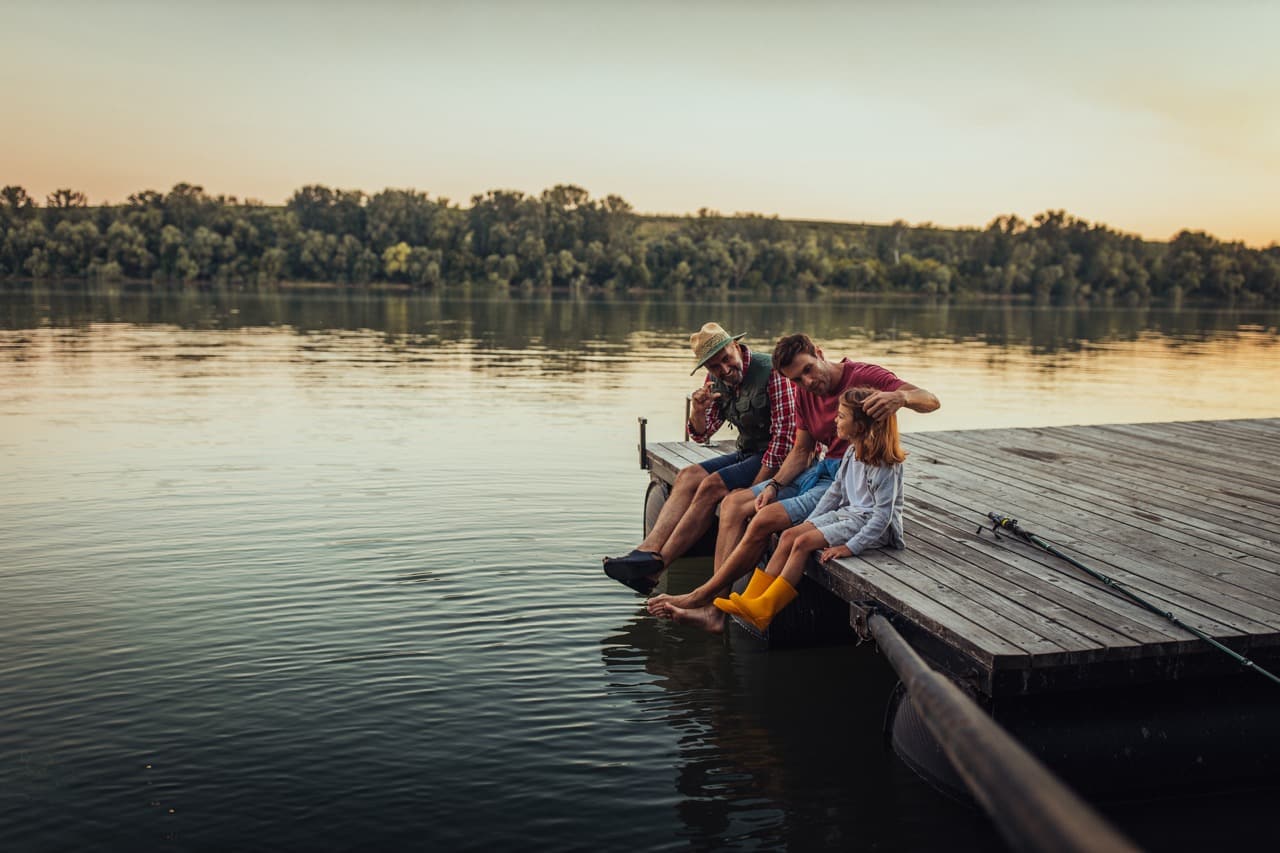 Family relaxing by the water