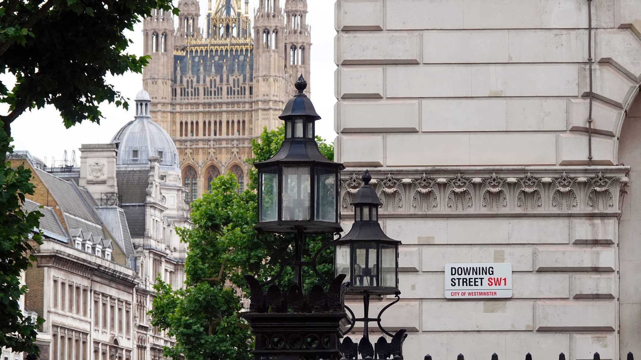 Downing Street in Westminster following political leadership changes and discussion about the impact on financial planning.
