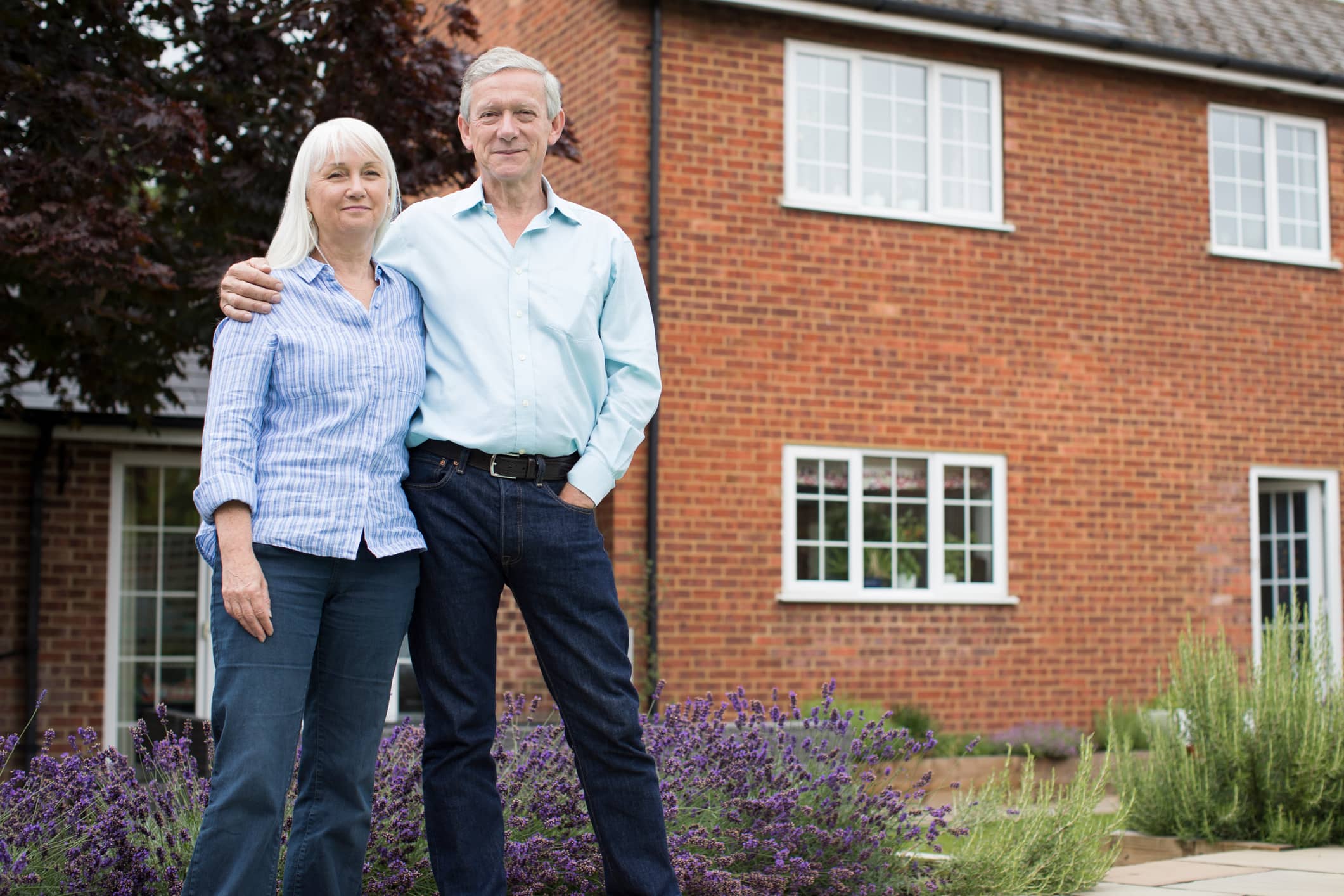 David and Helen outside their home after reviewing how to help their daughter buy her first house.