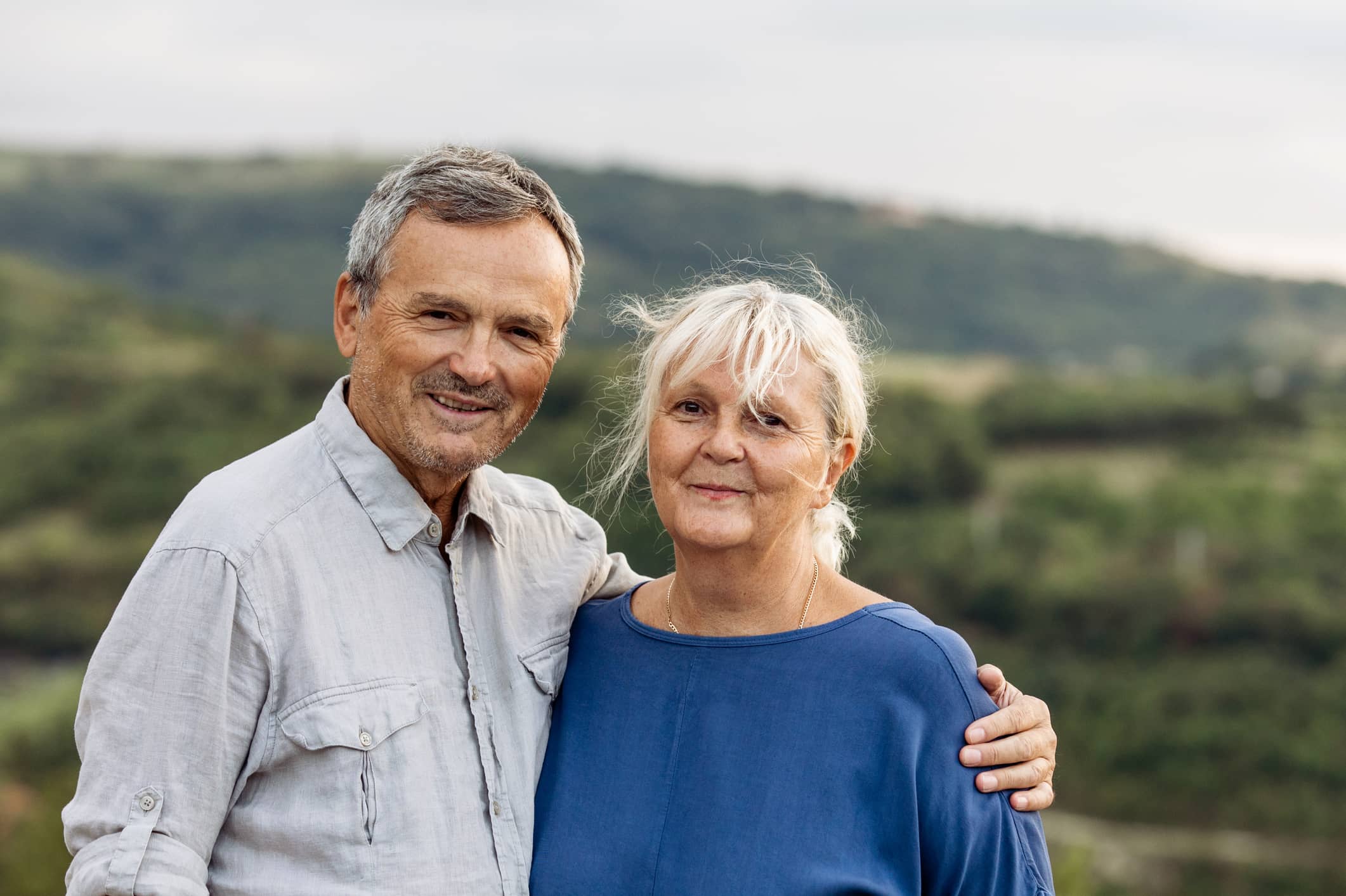 David, a retired man with his wife, whose retirement plan helped reduce the impact of sequencing risk during market volatility.