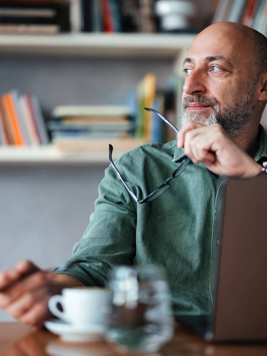 Man in his 50s considering his financial options after redundancy