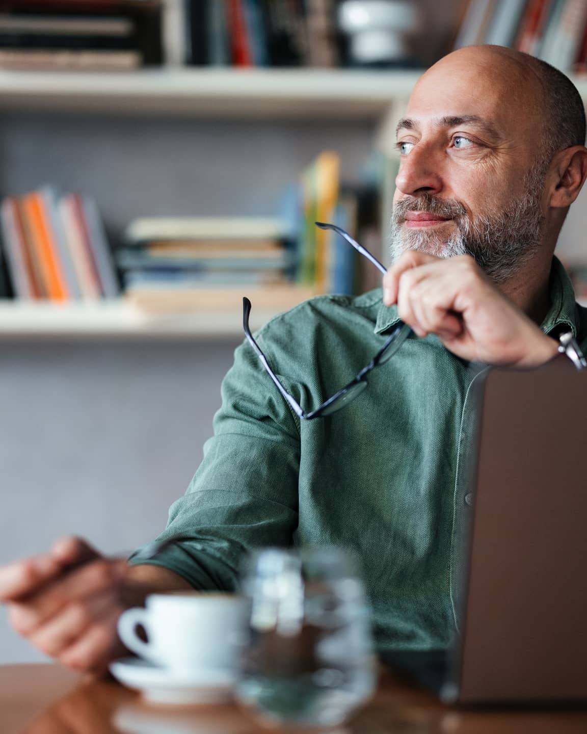 Man in his 50s considering his financial options after redundancy