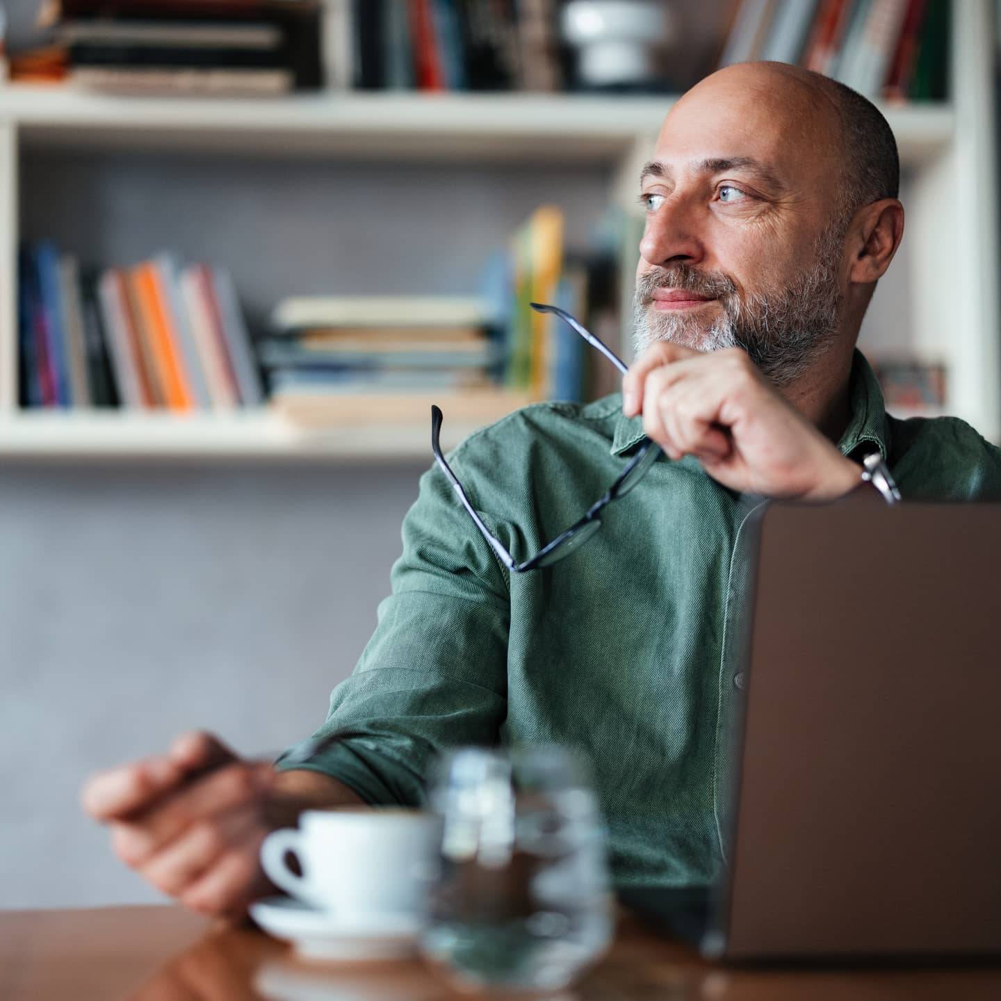 Man in his 50s considering his financial options after redundancy
