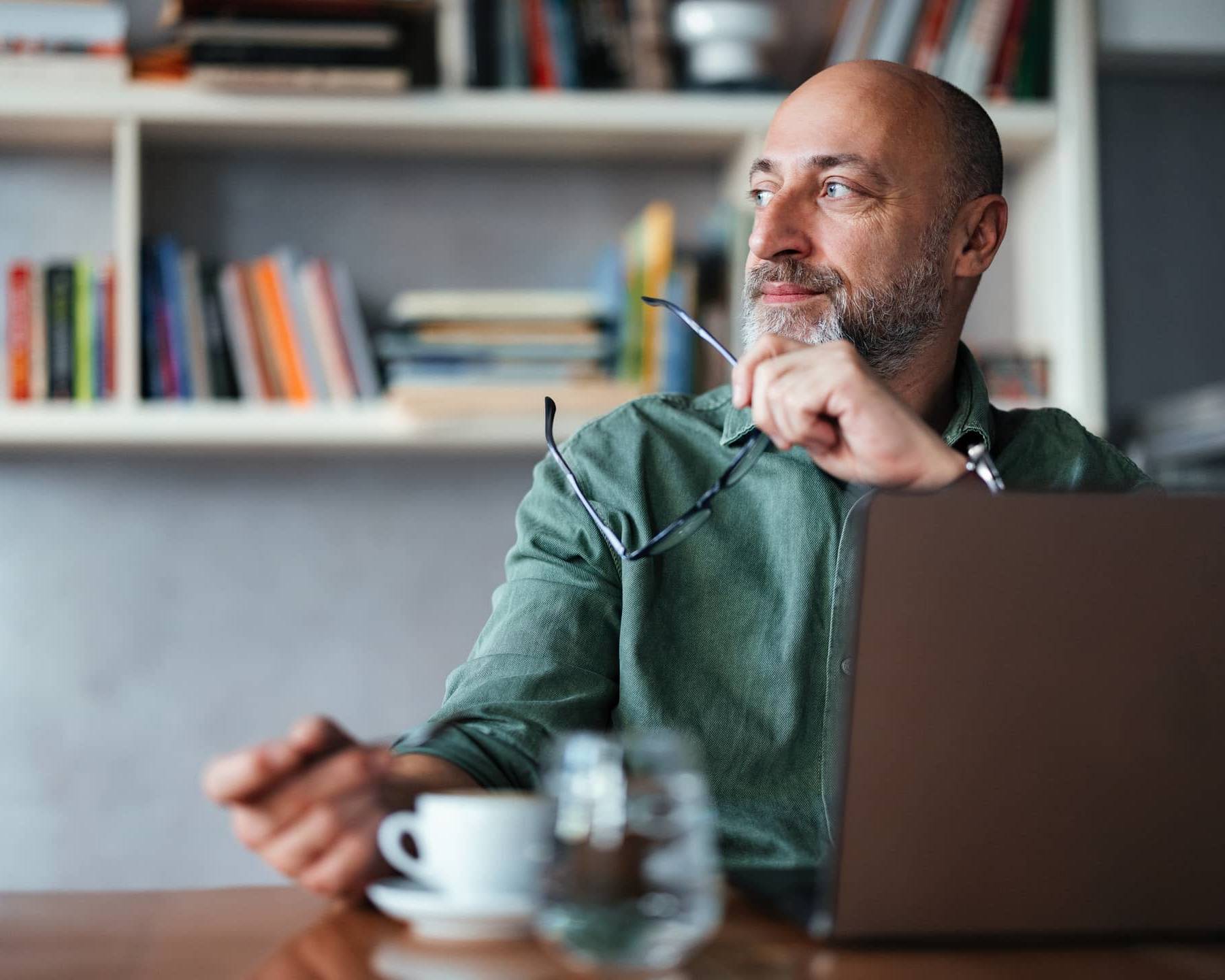 Man in his 50s considering his financial options after redundancy