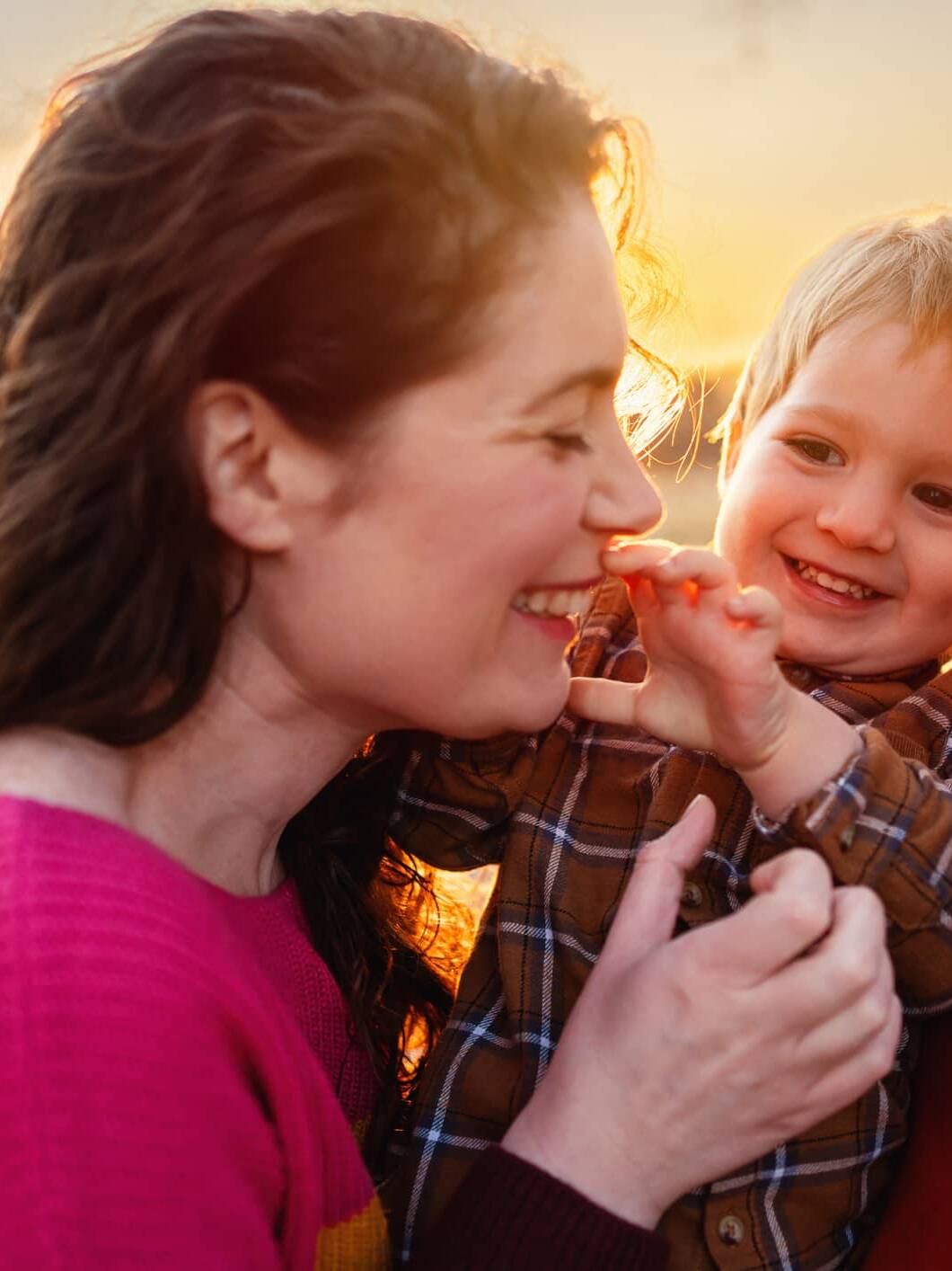 Parents enjoying time outdoors with their young child