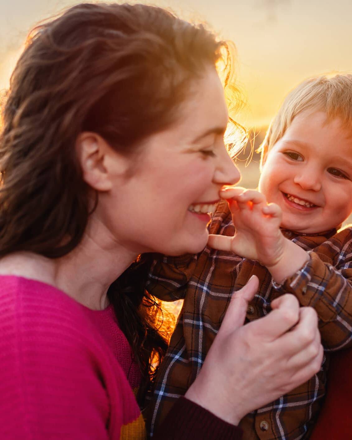 Parents enjoying time outdoors with their young child
